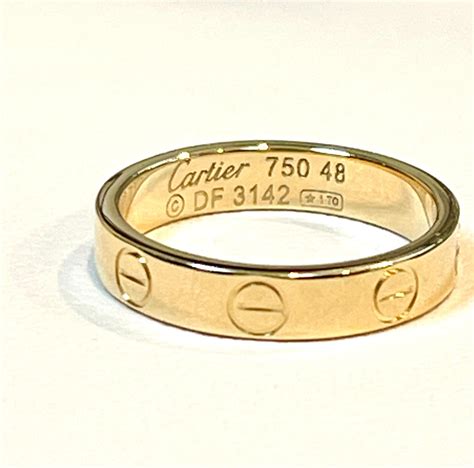 cartier 750 love ring 52833a 1t0|cartier 750 ring 52833a worth.